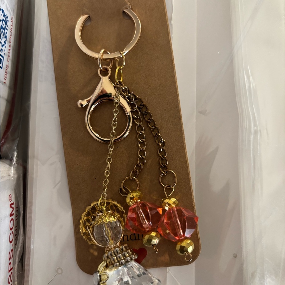 Elegant Gold and Orange Keychain Accessory